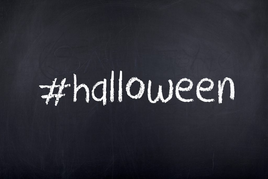 Halloween single word with hashtag on blackboard